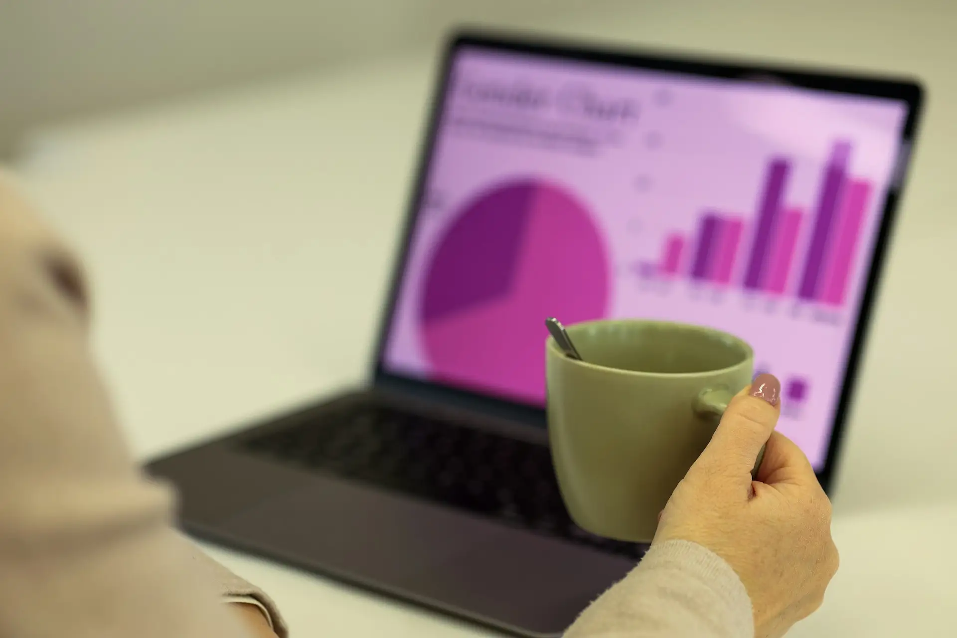 Financial charts and graphs on laptop